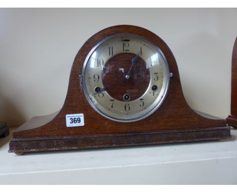 An oak case mantel clock with Westminster chimes eight day movement 
Condition report: Working 
