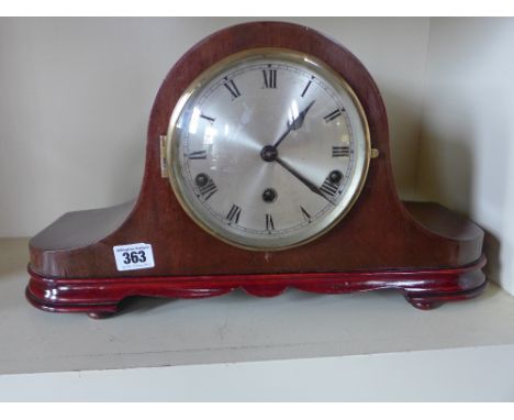 An eight day mahogany case mantel clock with Westminster chimes 
Condition report: Working with key