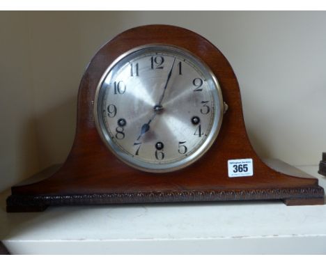 An eight day mahogany case mantel clock with Westminster chimes
Condition report: Working with key 