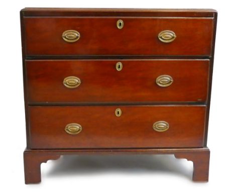 A 19th century mahogany chest of three long graduated drawers,  with brass plate handles, moulded edged top and bracket feet 