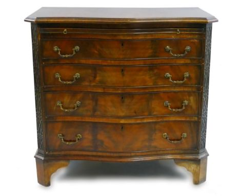 An early 20th century mahogany serpentine fronted chest, in the George III style, with moulded edged cross-banded top over a 