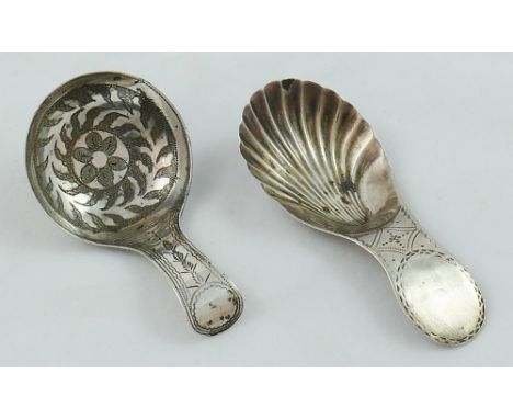 A George III silver bright cut engraved caddy spoon, by Joseph Willmore, Birmingham 1814, the bowl with floral engraved decor