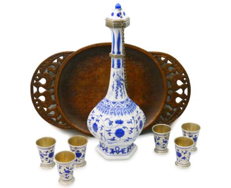 A Russian silver mounted and porcelain presentation flask together with six cups, the octagonal baluster flask by Popov, circ