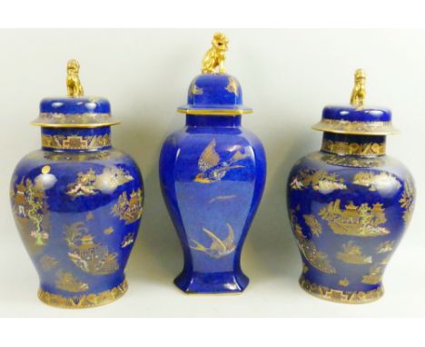 A pair of Wiltshaw and Robinson Carlton Ware temple vases with covers, each gilt transferred and enamelled in the Kang Hsi pa