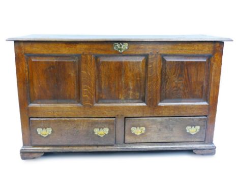 A George III oak mule chest, the moulded edged top with adapted double hinging opening to reveal a plain interior with candle