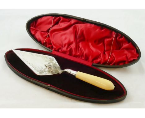 A Victorian silver and ivory trowel, by Martin & Hall, Sheffield 1895, with floral cast and engraved blade, plain handle, len