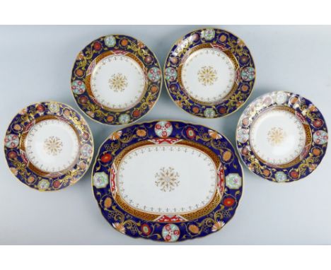 A Victorian Ashworth Real Ironstone china meatplate, of oval form with gilded motif to the centre surrounded by a maroon and 