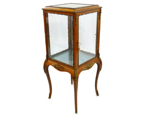 A French style gilt metal mounted mahogany vitrine, of square shaped form, the moulded edged top with bevelled glass panel, o