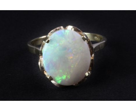 A 9ct yellow gold ring set with a large (approx. 3ct) opal. (P)