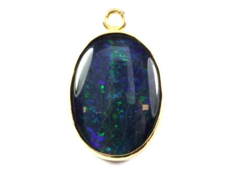 An 18ct gold (stamped 750) mounted triplet opal pendant, H. 2cm.