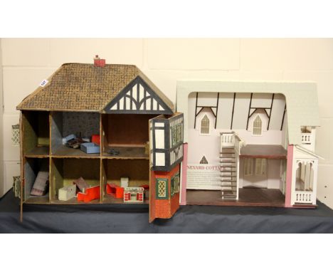 Two vintage dolls houses.