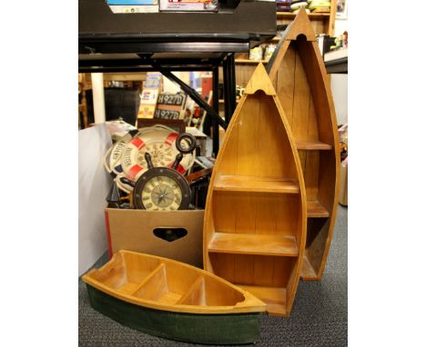 Three boat shaped shelf units and other boating and marine related items.