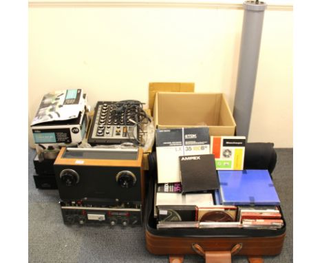A vintage commercial reel to reel tape player with a large quantity of audio tapes and a mixing box, etc.