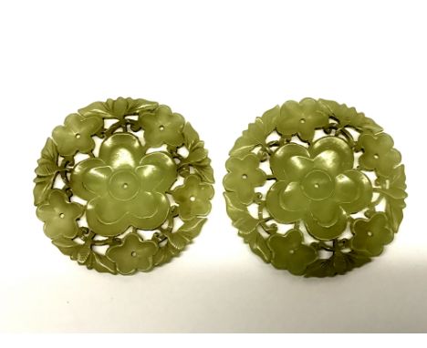 A pair of 19th century Chinese carved pale celadon jade hair ornaments, Dia. 5cm.