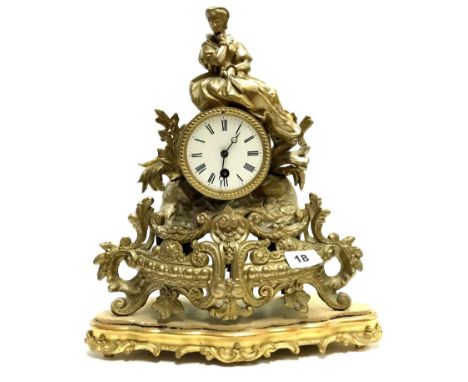 A French gilt spelter mantle clock with gilt wooden stand, H. 36cm.