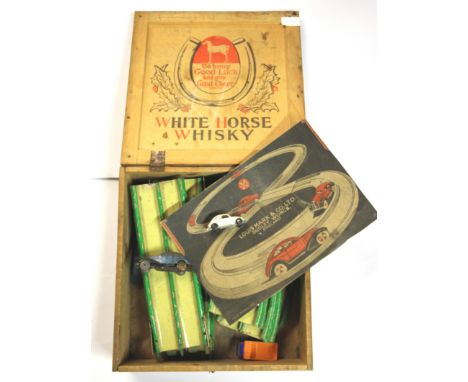 An early Louis Marx & Co tin plate car racing set.