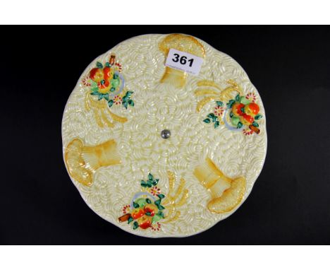 A Clarice Cliff Harvest pattern cake stand, Dia. 22cm.