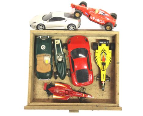 Seven Scalextric racing cars.