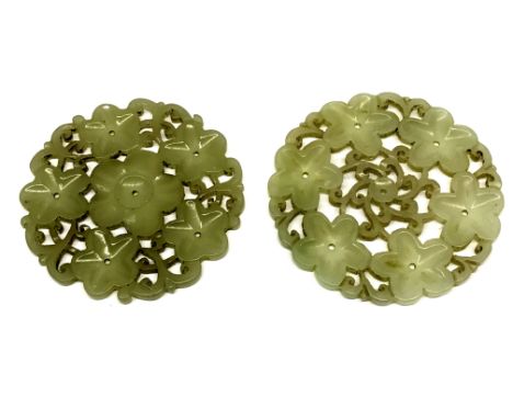 A pair of 19th century Chinese carved pale celadon jade hair ornaments, Dia. 5.5cm.