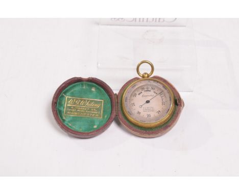 A late 19th Century cased pocket barometer
With a 4cm silvered dial signed WG Whiting, 6 Market Street, Manchester, compensat