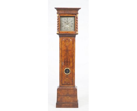 An 18th Century walnut and inlaid marquetry longcase clock
With a 28cm silvered dial signed Samuell Wainwright, North Hampton