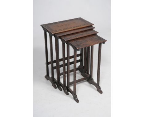 A quarteto of oak tea tables
The smallest carved with "Hale Holy Light Lead On to Victory", another carved with flags, carved