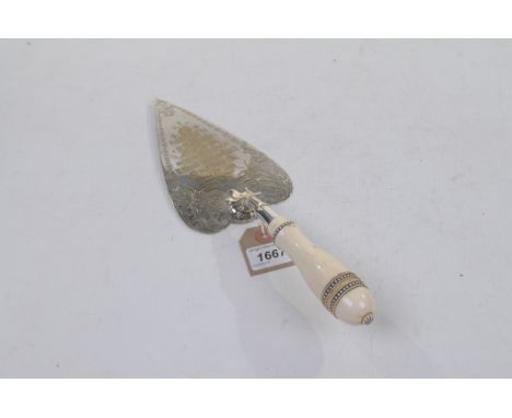 A silver plated and ivory presentation trowel
Leaf engraved and inscribed St Alban's Mission Church Dartford 1880 with a bead