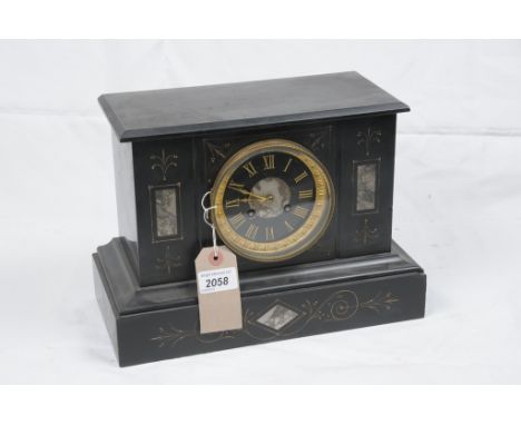 A Victorian slate noir mantel clock
With a 10cm dial with Roman numerals the two train with outside countwheel striking on a 