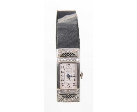 An Art Deco 18ct white gold ladies manual wind wristwatch 
The white dial with stylised Arabic numerals and rectangular inner
