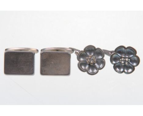 Two pairs of Georg Jensen sterling silver cufflinks
The first of floral form bearing Georg Jensen marks and numbered 46, the 