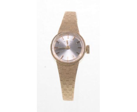 Rotary: A ladies 9ct gold manual wind cocktail watch
The champagne dial with applied hourly batons, the 9ct circular case to 