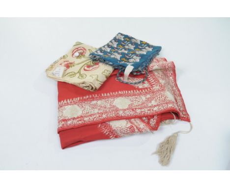 A hand embroidered square, early 20th Century
The hand silk work embroidery depicting meandering floral and foliate motifs to