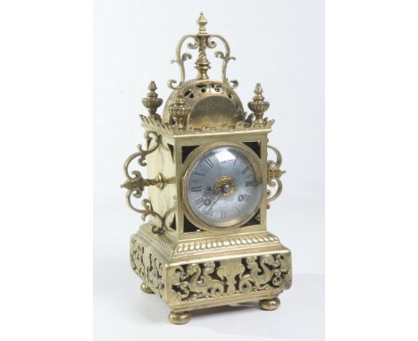 A French cast brass eight day mantel clock
With a 8cm convex dial with Roman numerals the two train movement striking on a co
