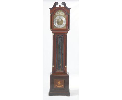 A fine Victorian mahogany and inlaid three train chiming longcase clock
With a 32cm brass and silvered dial signed Selfridge 