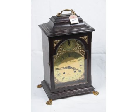 A stained wood bracket clock 20th Century reproduction
With a 17cm brass dial signed Hutt of Holland, the strike silent in th