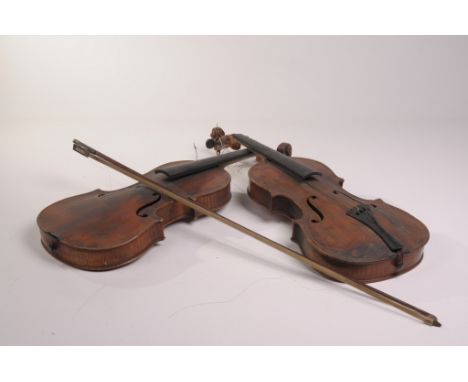 A violin with a printed Faux label Giovan Paolo Magginibrele
60cms, cracked and another violin bears a label Antonius Stradiv