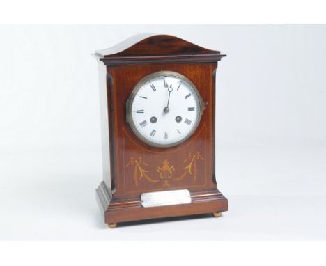 An Edwardian inlaid mahogany mantel clock
With a 11cm convex white dial, lacking seconds hand the two train Japy Freres movem