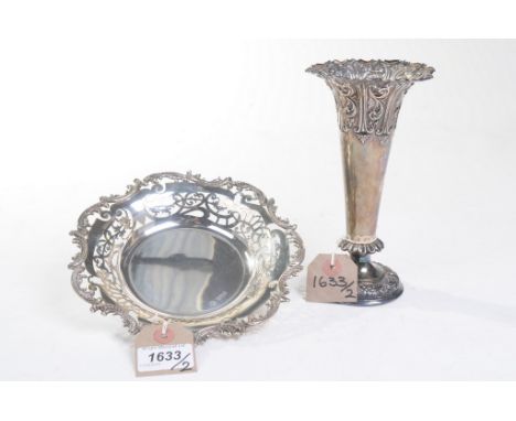 A Victorian silver pierced bowl and posy vase
Comprising scalloped circular dish with acanthus rim and pierced stylised folia