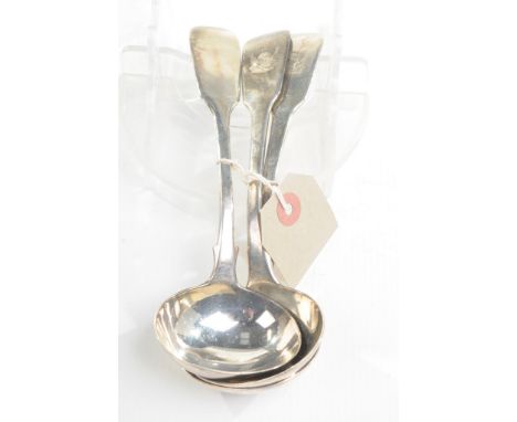 Three George IV hallmarked silver sauce ladles
Comprising a pair of fiddle pattern ladles, crested made by William Elley Lond