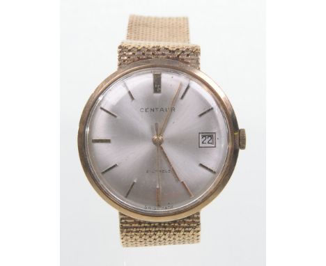 Centaur: a gentleman's 9ct gold cased manual wind bracelet watch
The champagne dial with applied hourly batons and date apert