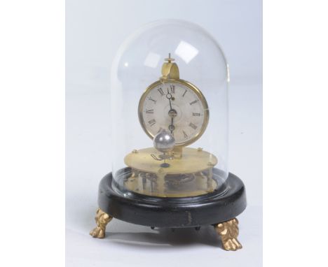 A Rotary pendulum clock
With a 6cm dial with Roman numerals, stamped with patent dates 1853 in the manner of the work by John