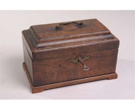 A George lll mahogany tea caddy
Of rectangular form with a shaped hinged cover, vacant interior raised upon a plinth base and