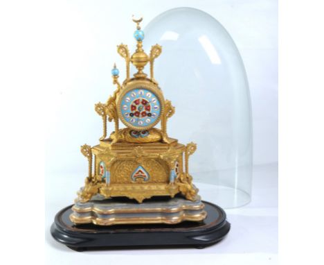 A French gilt spelter and enamel mantel clock
Signed W.H. Tooke, Paris with a 8.5cm blue and red enamel dial with jeweled rou