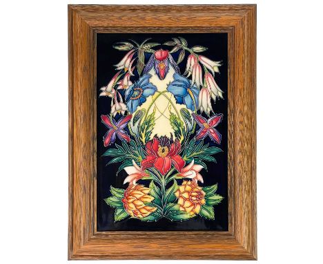 A Moorcroft limited edition framed plaque. Tube lined with floral decoration by Philip Gibson, number 120/250, dated 2004, th