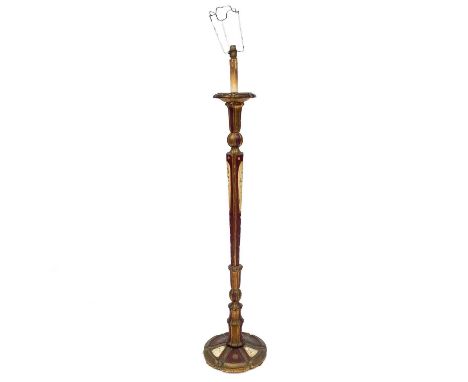 A lacquered and gilt standard lamp. Height 140cm.