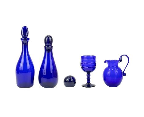 A modern Bristol blue glass decanter and stopper. Signed to base, together with another Bristol blue glass decanter and stopp