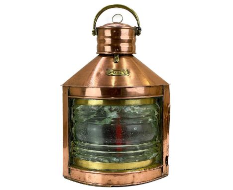 A copper and brass mast lamp. PORT, height 50cm width 36cm.