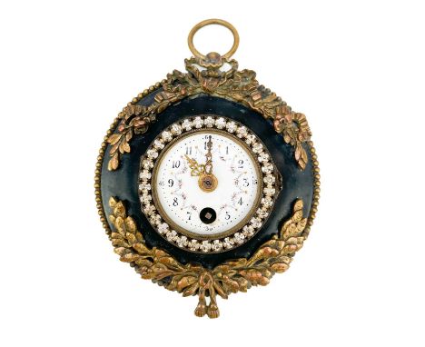 A 19th century French gilt metal black enamel circular wall clock. With an enamel face with Arabic numerals and floral swags,
