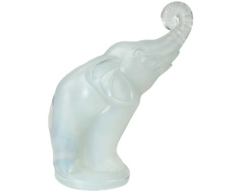 A Sabino opalescent glass elephant mascot. With raised trunk, etched mark, Sabino Paris, height 11cm.No issues noted.
