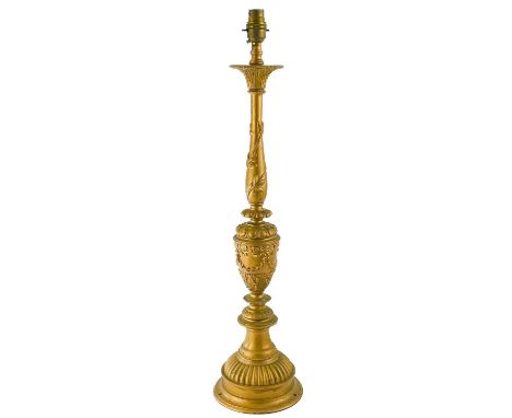 An early 20th gold painted cast metal table lamp. Height 56cm.